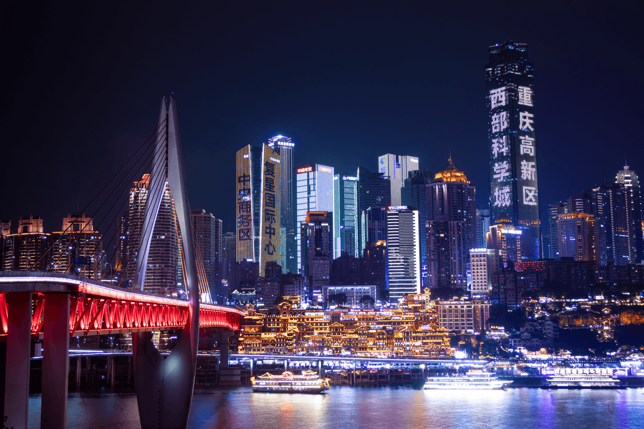 Chongqing city skyline and river bridges at night