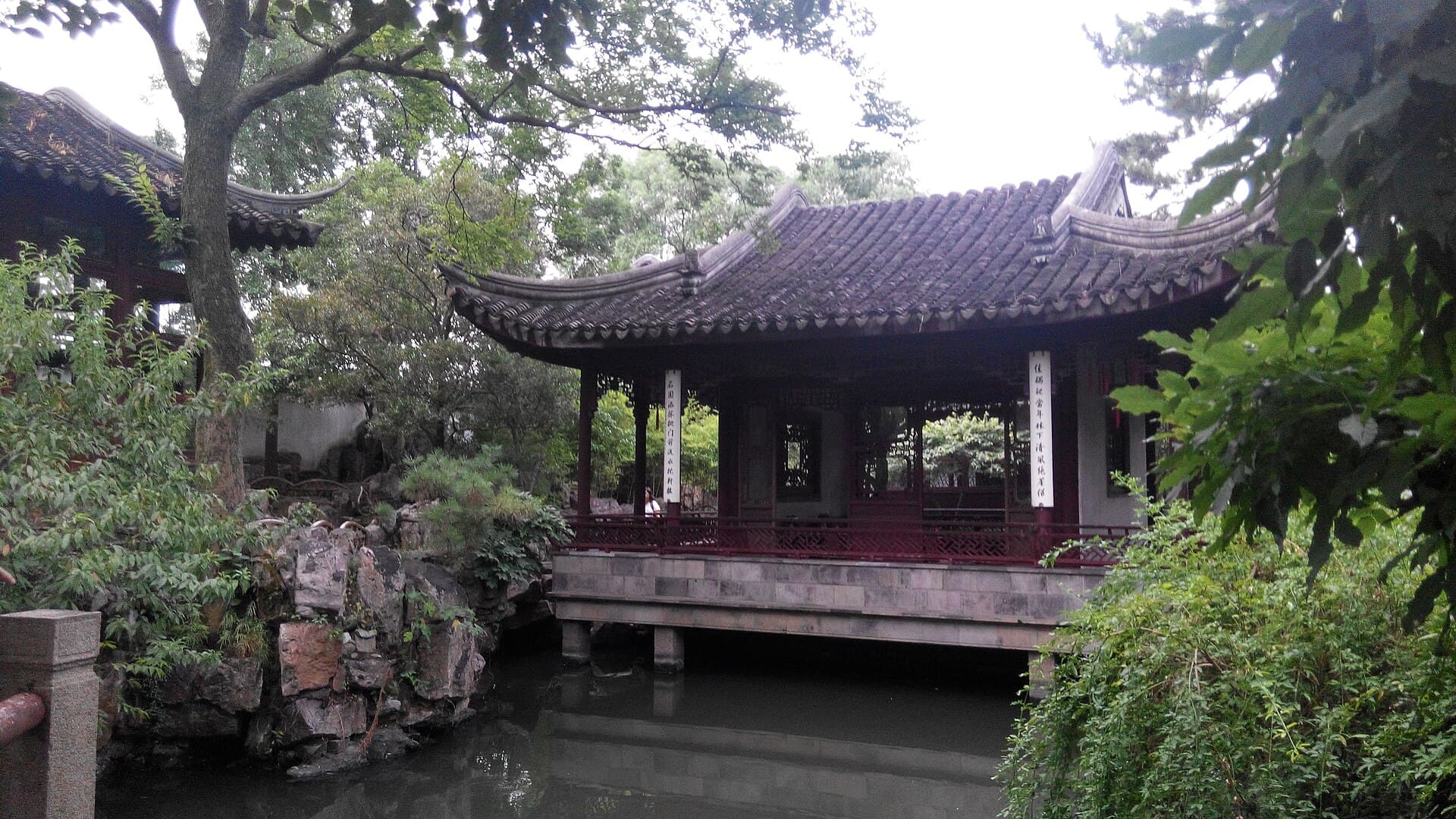 A pavilion reflected in a classical Suzhou garden